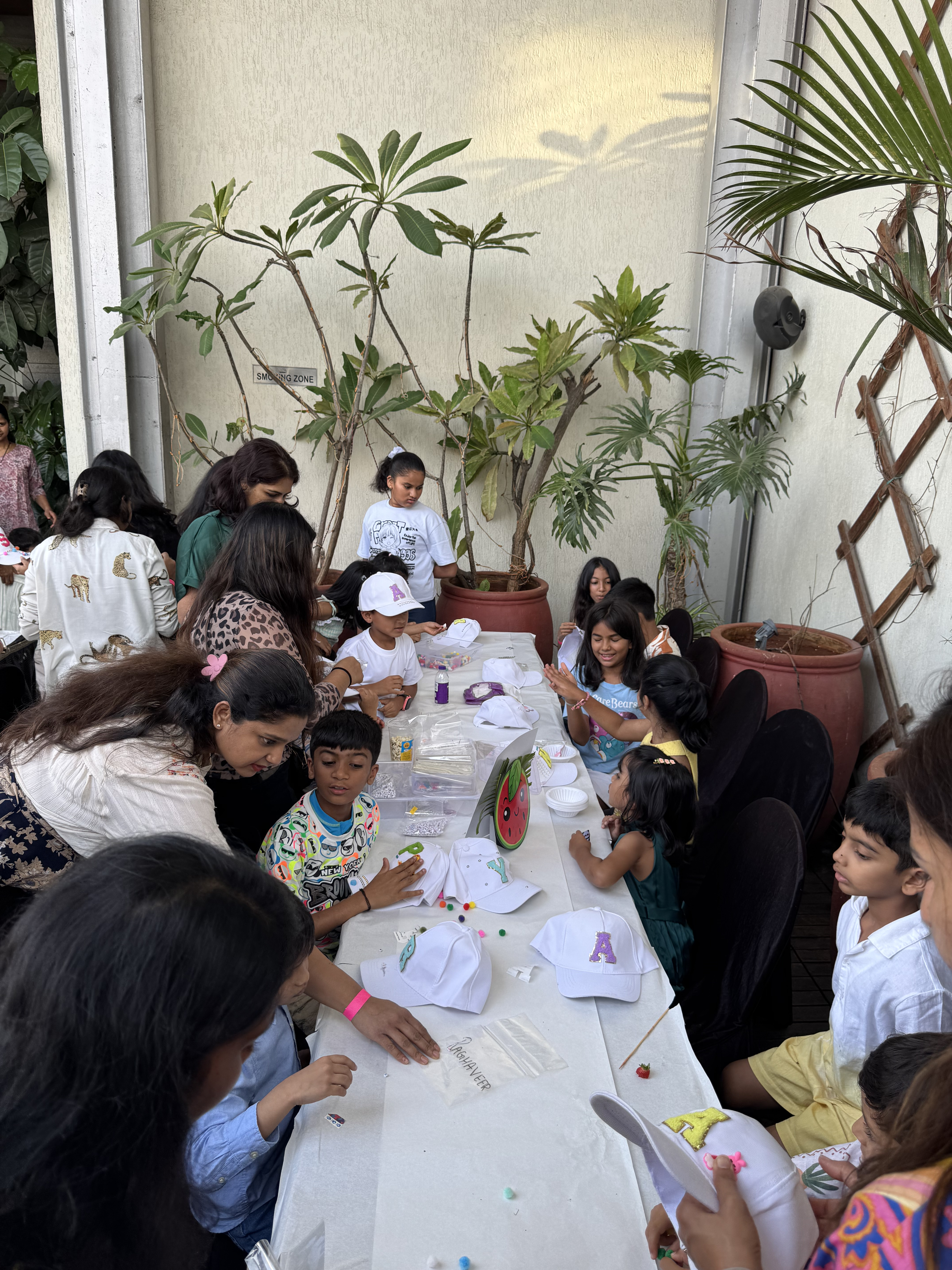 Teacher assisting students with hands-on activities